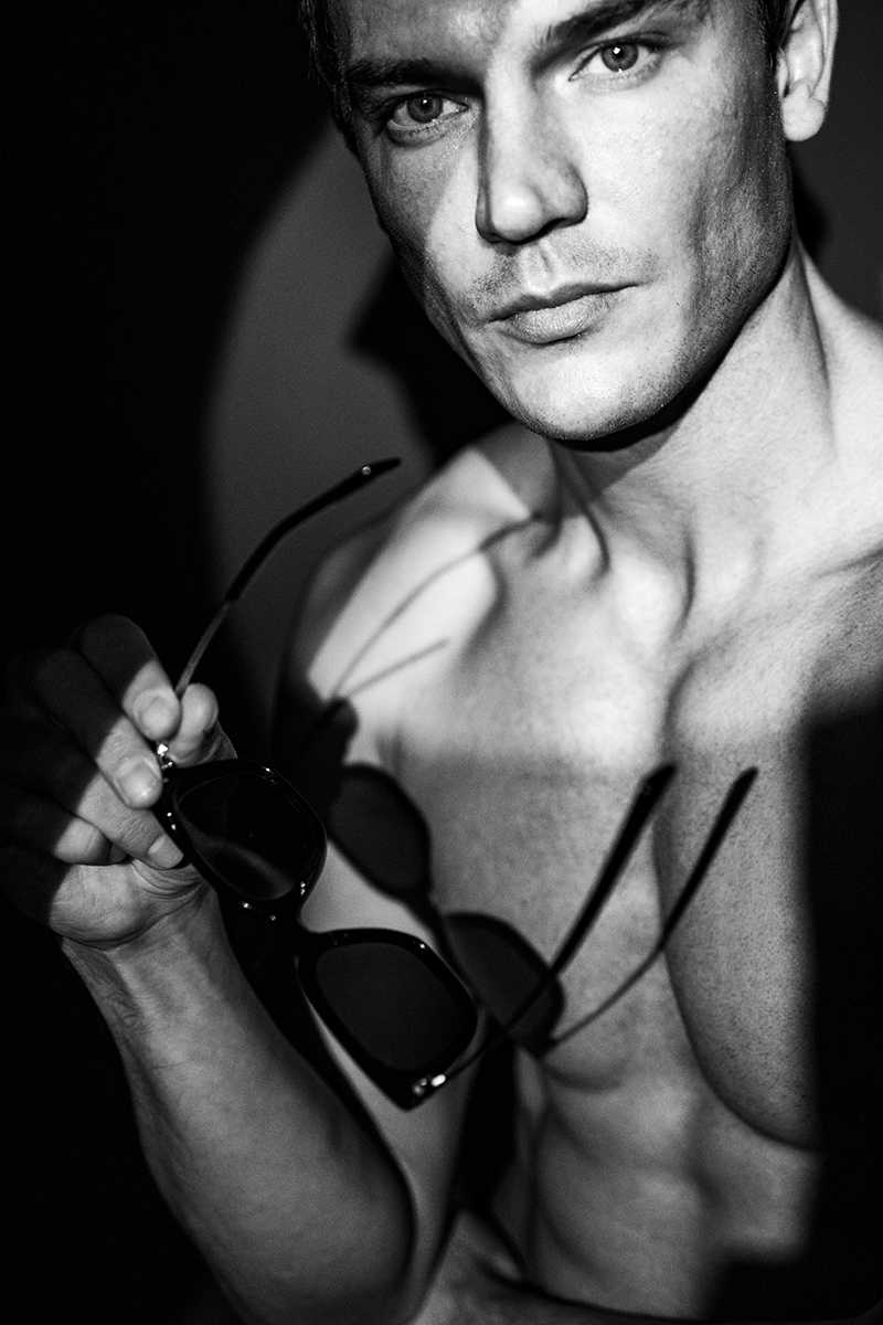 Male model & shades in black and white hard light